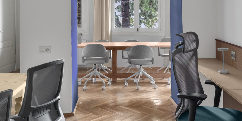 A Personal Desk room at TSRE — herringbone parquet and daylight